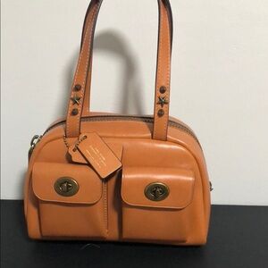 Coach upcrafted twin turn lock 20